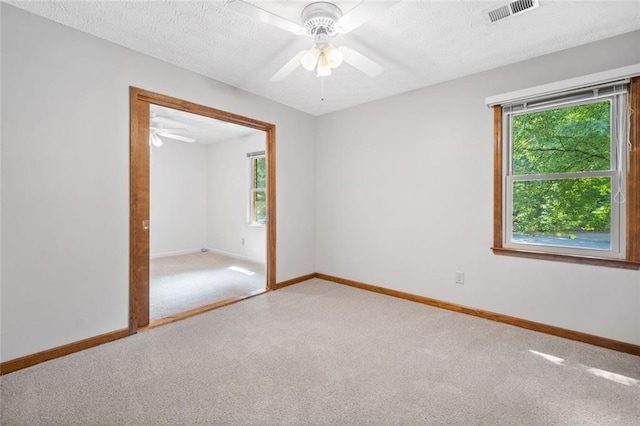 786 Mitsy Pt, Marietta, GA 30068 - carpeted spare room featuring ceiling fan and plenty of natural light