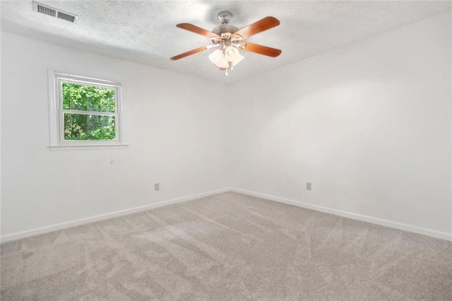 786 Mitsy Pt, Marietta, GA 30068 - empty room featuring carpet floors, a ceiling fan, and a textured ceiling