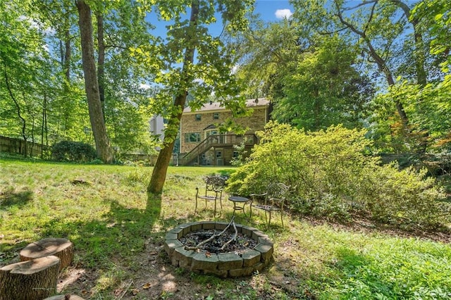 786 Mitsy Pt, Marietta, GA 30068 - view of green lawn with an outdoor fire pit and stairs