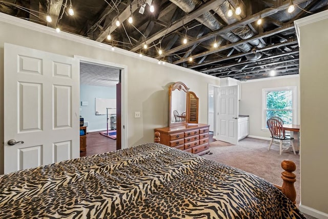 carpeted bedroom with track lighting