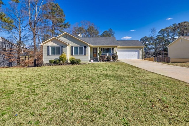 ranch-style home featuring a garage and a front lawn