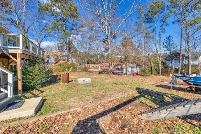 view of yard with a deck