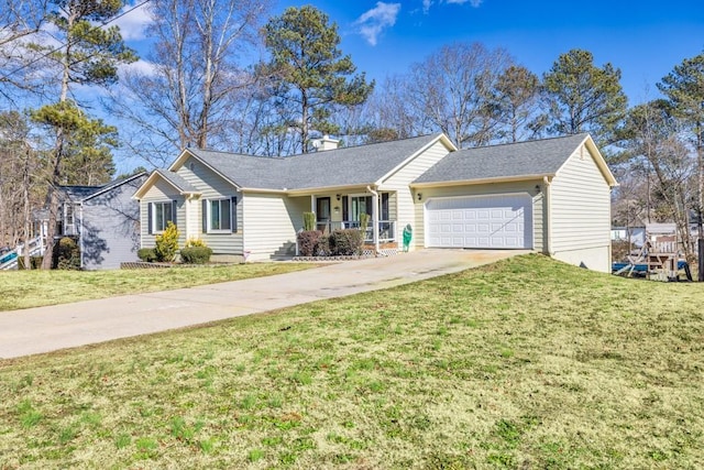 ranch-style house featuring covered porch, a garage, and a front lawn