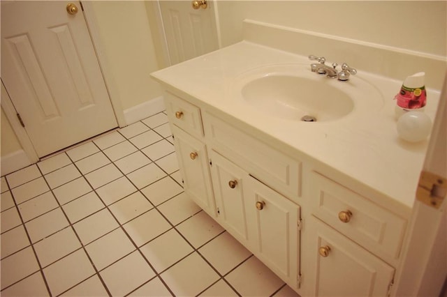 bathroom featuring vanity and tile patterned flooring