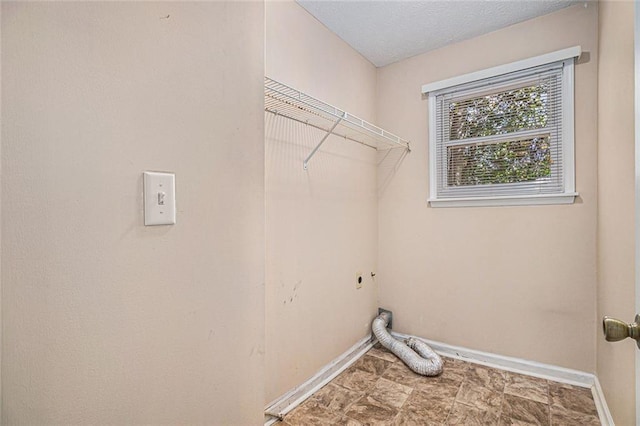 laundry area with electric dryer hookup