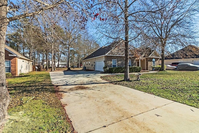 exterior space with a garage and a yard