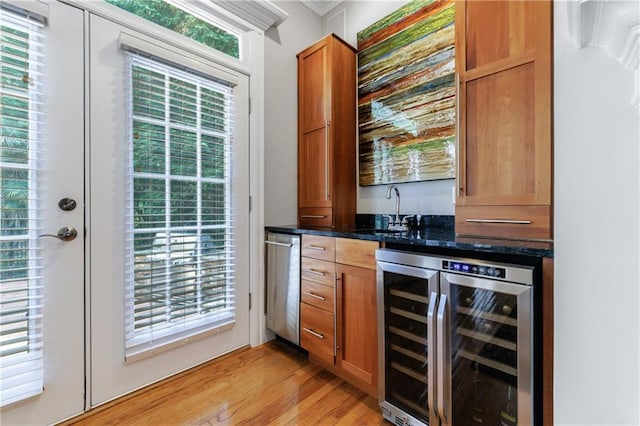 1255 Beech Haven Rd NE, Atlanta, GA 30324 - indoor wet bar featuring wine cooler, light wood-type flooring, and ornamental molding