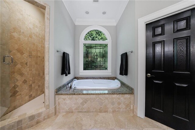 1255 Beech Haven Rd NE, Atlanta, GA 30324 - bathroom featuring a garden tub, a shower stall, ornamental molding, and tile patterned floors
