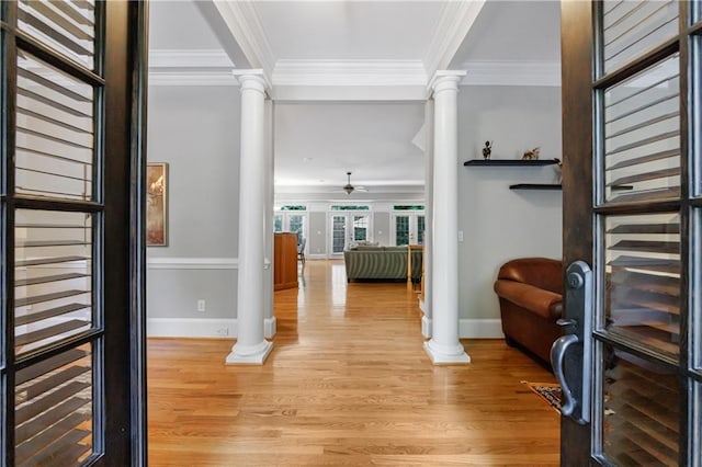 1255 Beech Haven Rd NE, Atlanta, GA 30324 - entryway with ornate columns, light wood finished floors, baseboards, ornamental molding, and a ceiling fan