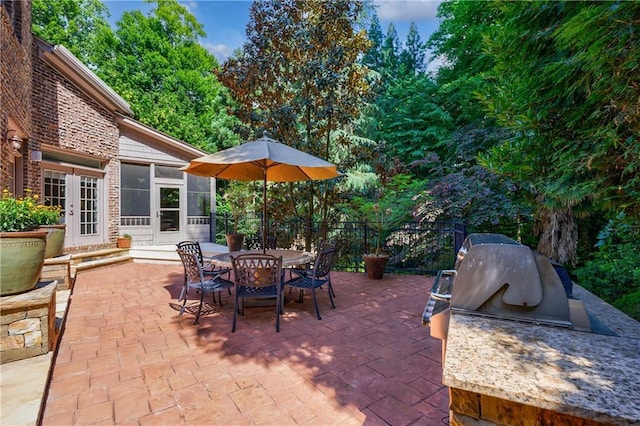 1255 Beech Haven Rd NE, Atlanta, GA 30324 - view of patio with a sunroom and outdoor dining area
