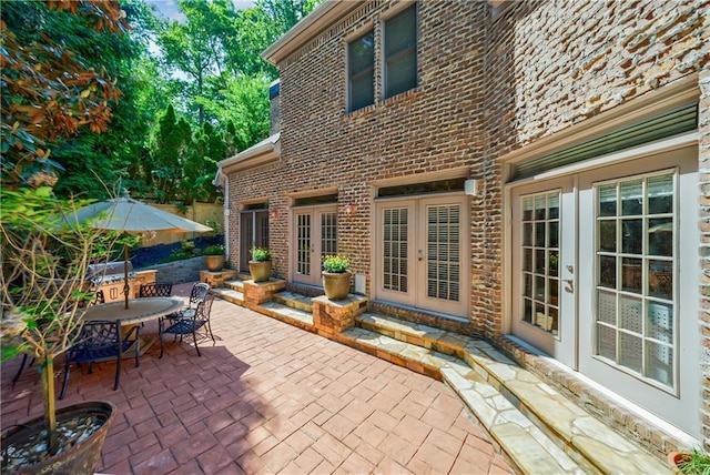 1255 Beech Haven Rd NE, Atlanta, GA 30324 - view of patio / terrace with french doors and outdoor dining space