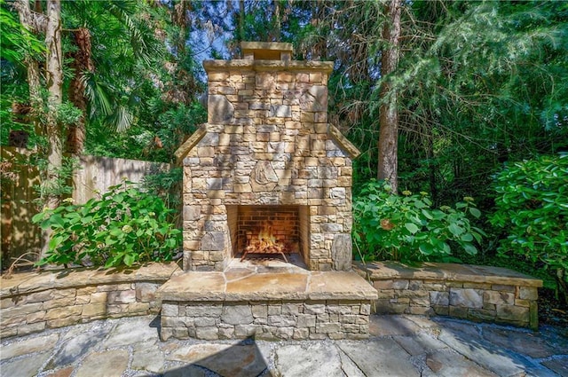 1255 Beech Haven Rd NE, Atlanta, GA 30324 - view of patio / terrace featuring an outdoor stone fireplace