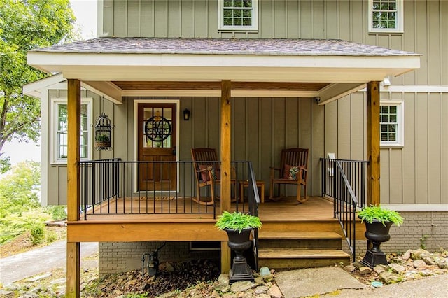 doorway to property featuring covered porch