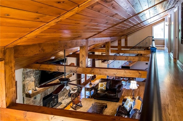 living room featuring wood ceiling, vaulted ceiling, and hardwood / wood-style floors