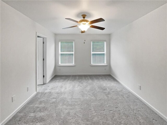 3513 Lakeview Crk, Lithonia, GA 30038 - carpeted spare room featuring baseboards and a ceiling fan