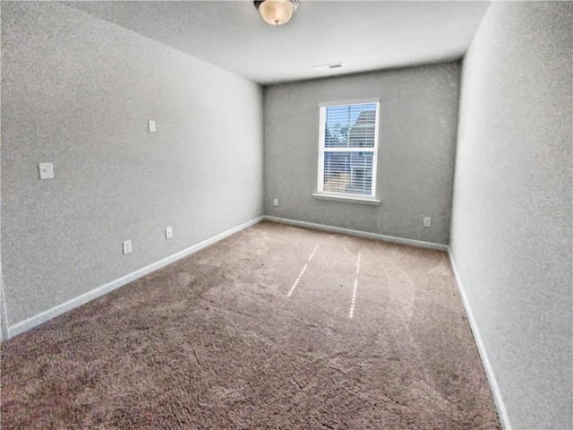 unfurnished room with carpet