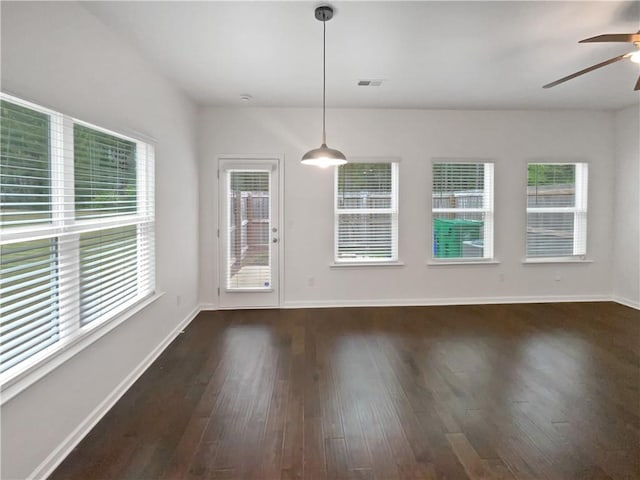 3513 Lakeview Crk, Lithonia, GA 30038 - unfurnished dining area featuring baseboards, ceiling fan, wood finished floors, and visible vents