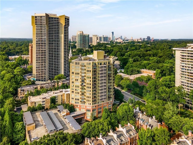 birds eye view of property with a city view