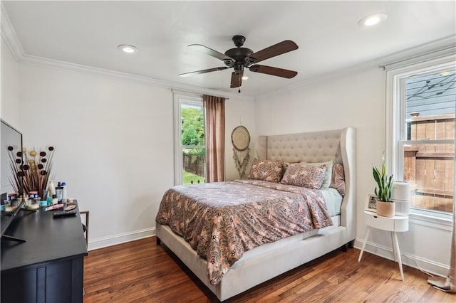 bedroom featuring a ceiling fan, wood finished floors, baseboards, recessed lighting, and ornamental molding