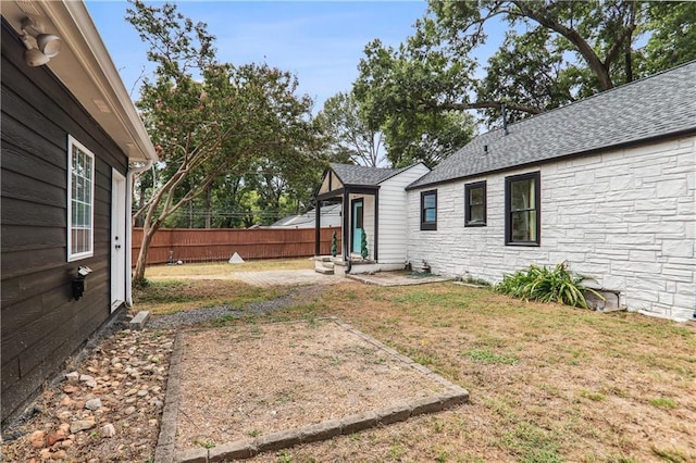 view of yard featuring fence