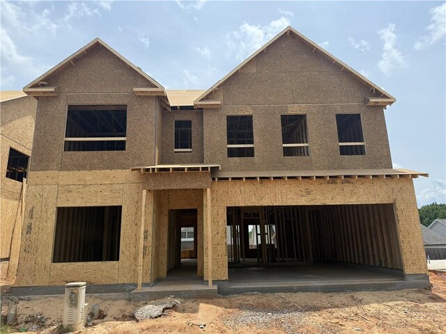 345 Ridge Pointe Dr, Athens, GA 30606 - tudor home featuring board and batten siding, roof with shingles, and a front yard