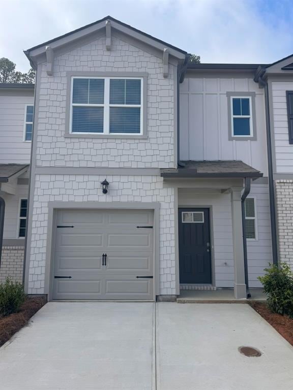 view of front of home with a garage