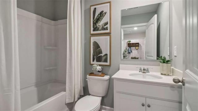 bathroom with toilet, shower / tub combo with curtain, and vanity