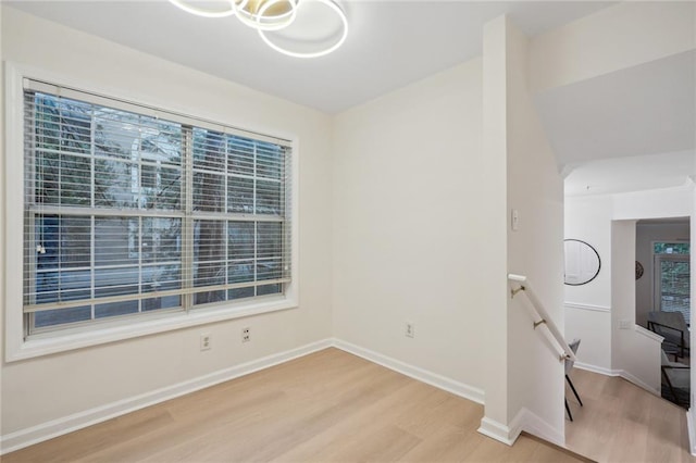 unfurnished room featuring light hardwood / wood-style flooring