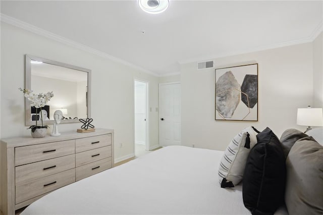 bedroom featuring crown molding