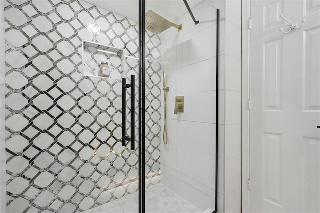 bathroom featuring an enclosed shower