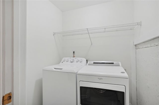 laundry room with washer and dryer