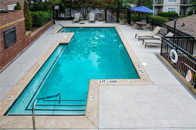 4254 River Green Dr NW Unit 616, Atlanta, GA 30327 - pool with a patio and fence