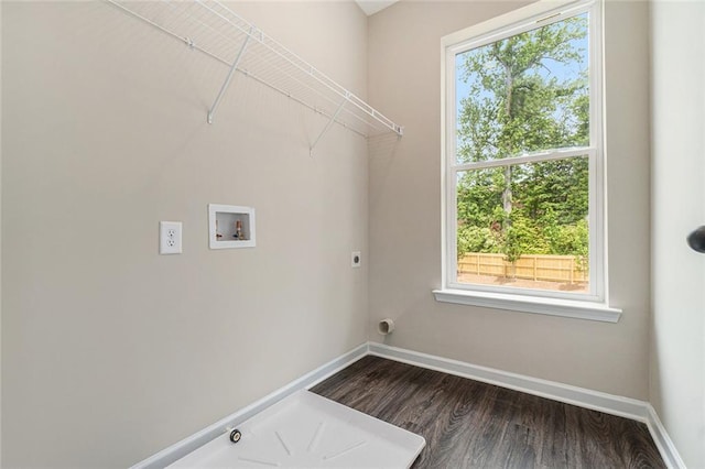 laundry area featuring washer hookup, dark wood-type flooring, electric dryer hookup, laundry area, and baseboards