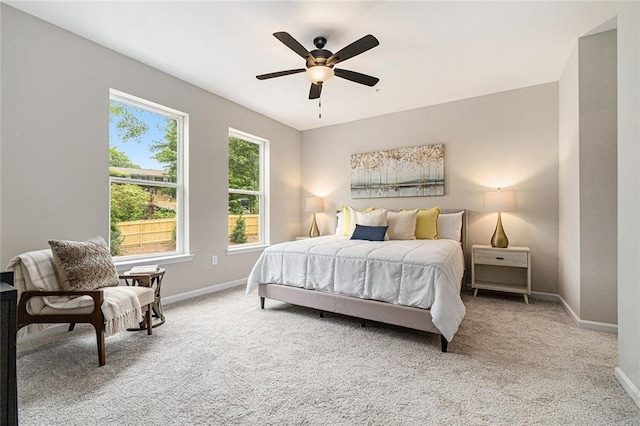 bedroom featuring carpet, ceiling fan, and baseboards