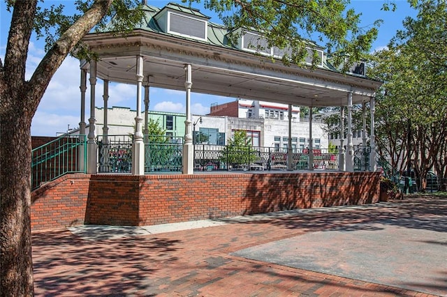 view of patio / terrace featuring fence