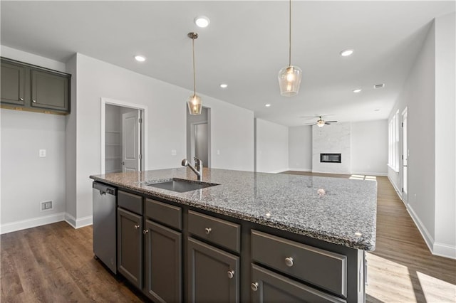 46 Cooper Dr, Mansfield, GA 30055 - kitchen with dishwasher, stone counters, a ceiling fan, dark wood-type flooring, and recessed lighting