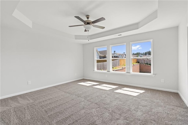 46 Cooper Dr, Mansfield, GA 30055 - carpeted spare room featuring a raised ceiling and ceiling fan
