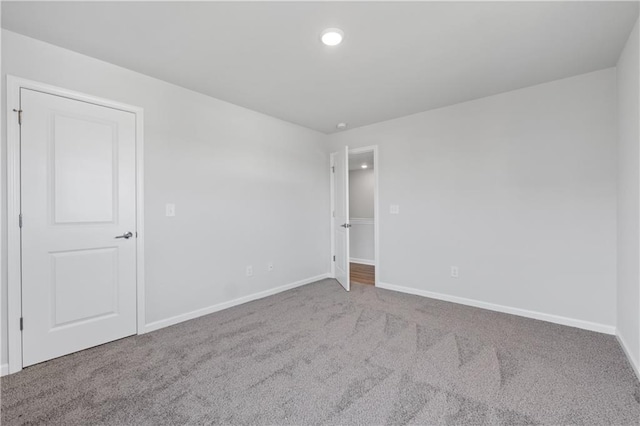 46 Cooper Dr, Mansfield, GA 30055 - carpeted spare room with baseboards and recessed lighting
