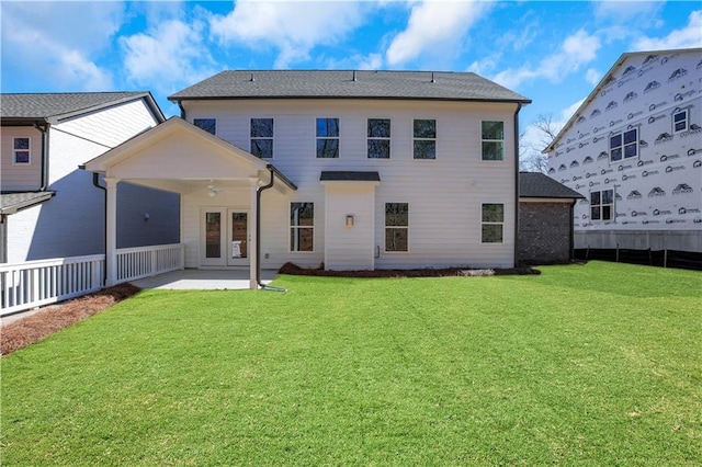 back of house featuring ceiling fan, a lawn, a patio area, and fence