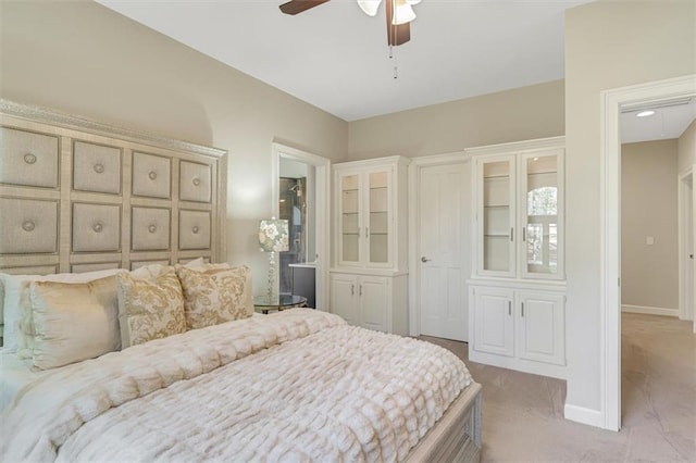 bedroom featuring carpet flooring, ceiling fan, and baseboards