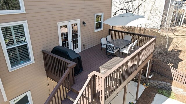 5073 Kingsbridge Pass, Powder Springs, GA 30127 - deck with outdoor dining space, french doors, and stairs