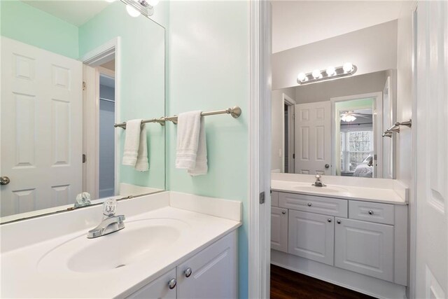 5073 Kingsbridge Pass, Powder Springs, GA 30127 - bathroom featuring ensuite bath, two vanities, and a sink