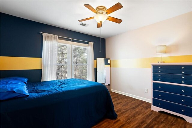 5073 Kingsbridge Pass, Powder Springs, GA 30127 - bedroom with baseboards, wood finished floors, visible vents, and ceiling fan