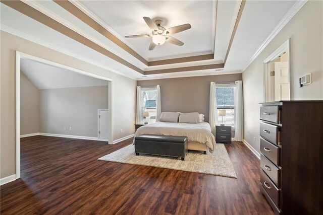 5073 Kingsbridge Pass, Powder Springs, GA 30127 - bedroom featuring baseboards, crown molding, a tray ceiling, and dark wood-type flooring