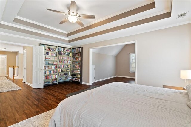 5073 Kingsbridge Pass, Powder Springs, GA 30127 - bedroom featuring baseboards, wood finished floors, a tray ceiling, and visible vents