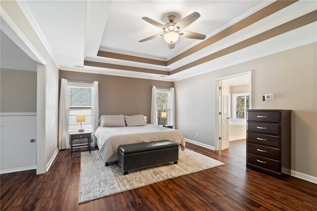 5073 Kingsbridge Pass, Powder Springs, GA 30127 - bedroom featuring baseboards, ornamental molding, wood finished floors, and a raised ceiling