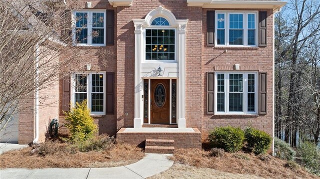 5073 Kingsbridge Pass, Powder Springs, GA 30127 - property entrance with brick siding