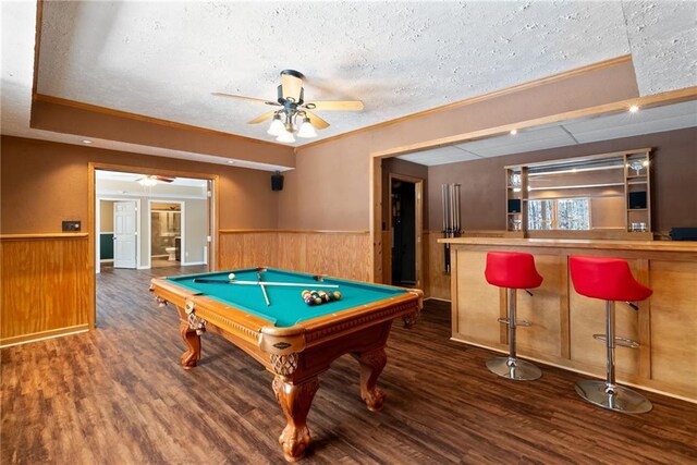 5073 Kingsbridge Pass, Powder Springs, GA 30127 - playroom featuring wood finished floors, a textured ceiling, a ceiling fan, and a wainscoted wall