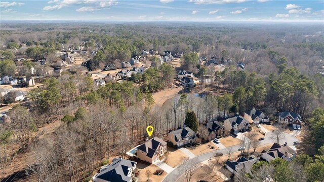 5073 Kingsbridge Pass, Powder Springs, GA 30127 - bird's eye view with a forest view and a residential view