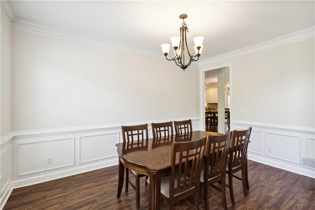 5073 Kingsbridge Pass, Powder Springs, GA 30127 - dining room with a chandelier, dark wood-type flooring, and ornamental molding